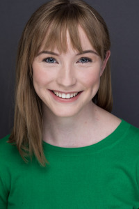 annelise green shirt headshot (1)-2f6354cb